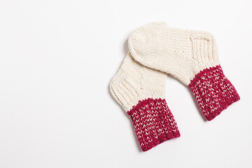 knitted wool socks on a white background