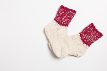knitted wool socks on a white background