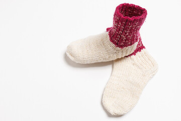 knitted wool socks on a white background