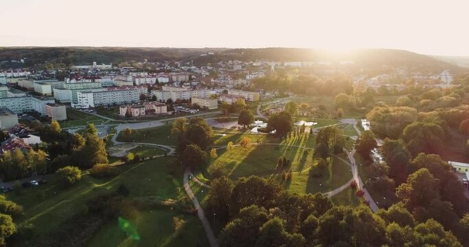 Sunset over beautiful city park outdoor space in Reda, northern Poland, central Europe town