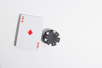 playing cards and poker chips on a white background