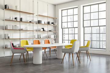 Corner view on bright office room interior with meeting board