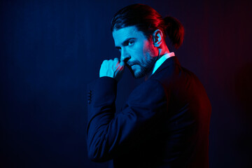 stylish man in a jacket posing self confidence lifestyle model