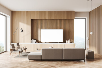 Living room interior with seats, drawer and tv set with mockup screen