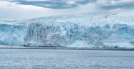 Fototapeta na wymiar Approaching Yankee Harbour landing, Greenwich Island, South Shetland Islands, Antarctica.