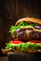 Burger Close Up View on Wooden Background