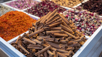 Cinnamon background. Pile of cinnamons stick close up