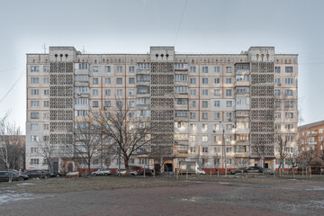 Old Soviet prefabricated nine-storey panel apartment building with tree entrances. Zhytomyr,...