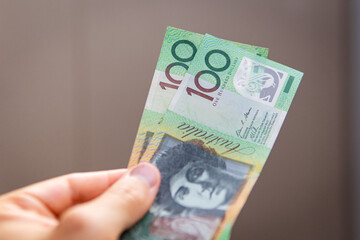 two Australian 100 dollar notes cash