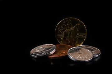 Czech crown  coins of various denominations on a black background