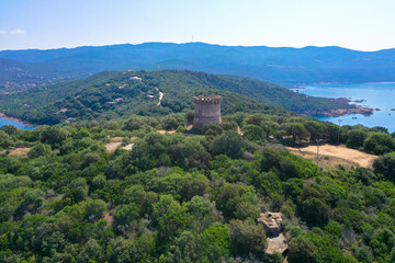 Panoramic aerial view of the Corsican coast with a Genoese watchtower near the capital Ajaccio. Corsica, France.