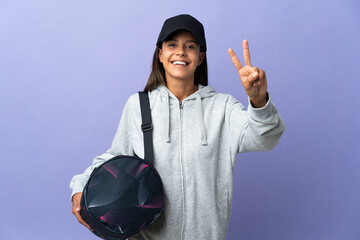 Young sport woman with sport bag smiling and showing victory sign