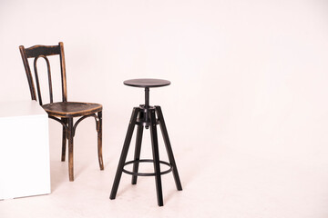 Bar black chairs and retro chair on a white background With copy space