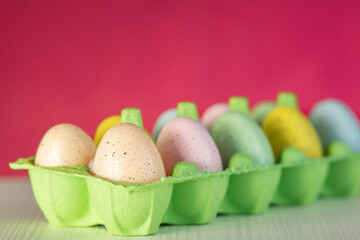 egg hunt, easter party, spring happy holiday tradition for kids on a pink background with place for text, copy space