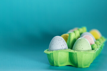 Easter eggs in a box, space for text