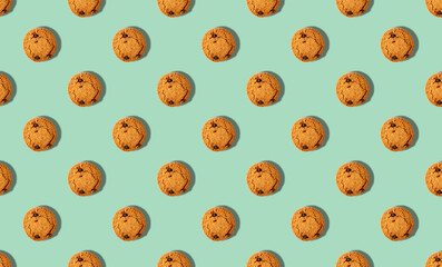 pattern of oatmeal cookies on a pink background
