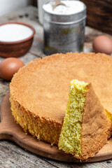 Homemade sponge cake with ingredients eggs. flour milk and sugar, Bakery background concept. vertical image. top view. place for text