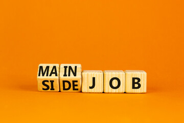 Extra or side job symbol. Turned wooden cubes and changed concept words Side job to Main job. Beautiful orange table orange background, copy space. Business side or main job concept. - obrazy, fototapety, plakaty