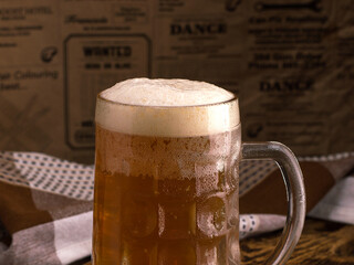 mug of light beer, foamy drink.