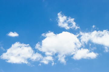 Naklejka na ściany i meble Blue sky and white cloud. Natural background and texture.
