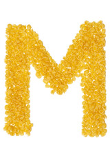 Letter M made from food on a white background - obrazy, fototapety, plakaty