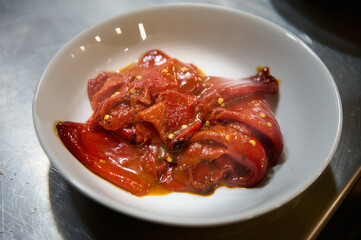 Fried red peppers with olive oil