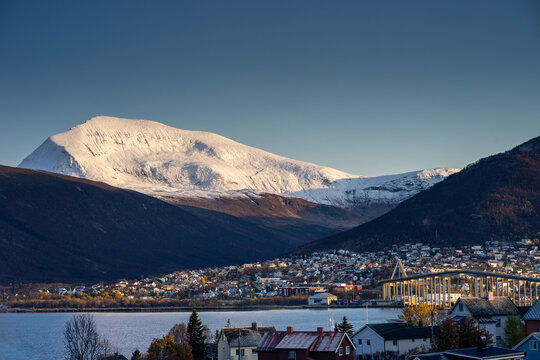 Snow covered mountain with a cute northern city