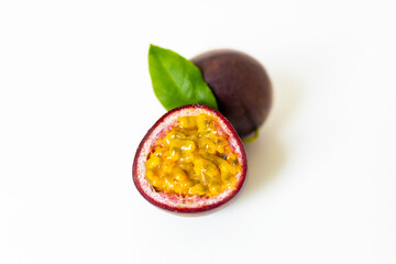 Passion fruit isolated. Whole passionfruit and a half of maracuya isolated on white background.