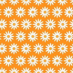 Seamless chamomile vector pattern. Floral textile design flowers on orange