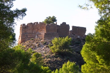 Fototapeta premium Old and deteriorated Muslim castle of La Luz located on a hill of Monte del Valle in Algezares, Murcia