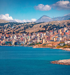 Bright summer cityscape of Saranda port. Attractive Ioninan seascape. Wonderful morning scene of Albania, Europe. Traveling concept background.