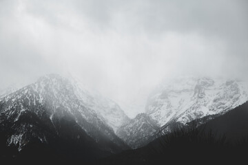 Foggy Snowed Mountain Peaks
