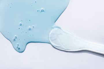 Liquid gel cosmetic smudge drops texture blue grey texture background