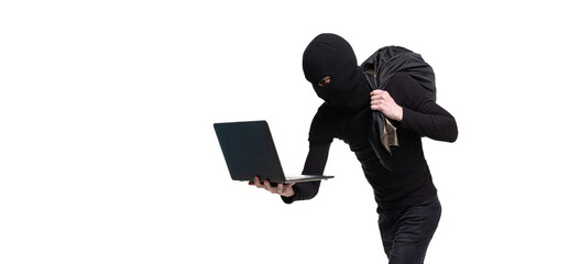 Portrait of young anonymous person wearing black outfit and balaclava isolated on white background. Concept of art, fashion, anti-terrorizm