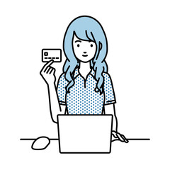 デスクで座ってPCを使いながらクレジットカードを手に持っているポロシャツの女性