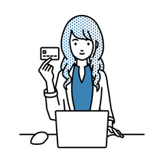 デスクで座ってPCを使いながらクレジットカードを手に持っているジャケットの女性