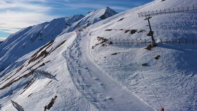 Aerial drone footage of the Anzere ski resort in winter in the Canton Valais in the alps in Switzerland