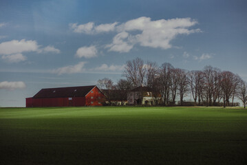 Fototapeta na wymiar A Swedish farm house in the spring.