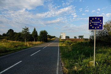 sign on the road , poland and germany border sign,taken in stettin szczecin west poland, europe - obrazy, fototapety, plakaty