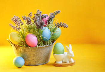 easter still life. Yellow colours. Multicolour easter eggs. Christianity. Celebrate holidays 