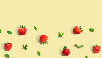 Fresh red strawberries with mints overhead view - flat lay