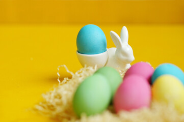 easter eggs in a basket. Colourful eggs. Rabbit. Christianity 