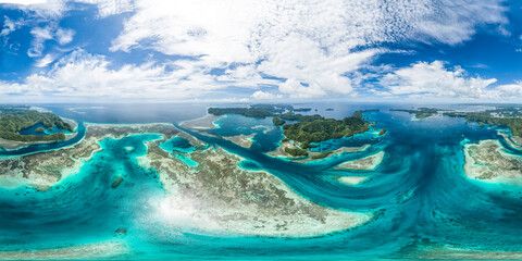 Wide panoramic aerial view of coral reefs islands and tropical seascape