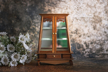 Antique wooden cabinet with mirror and drawers