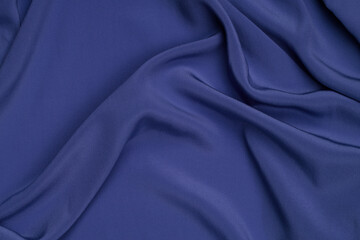 Smooth elegant blue silk or satin luxury cloth texture can use as abstract background.