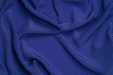 Luxurious blue satin background close up. TEXTURE