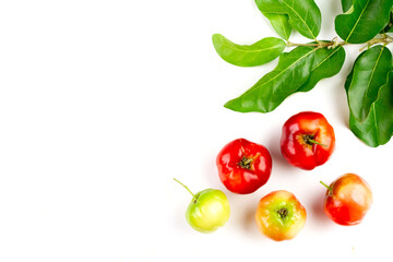 Acerola Cherry or Barbados Cherry with green leaf isolated on white background, top view.