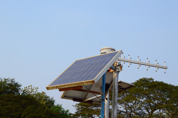 Solar cell towers against bright blue sky clean energy concept