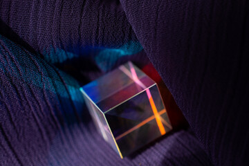 Optical glass cubes scatter spectrum light with all the colors of the rainbow on the surface