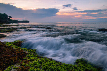 Fototapeta na wymiar sunset on tunggak sabo beach, bali - indonesia